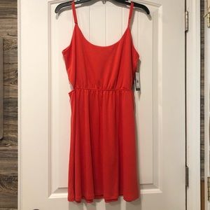 New with tags Volcom woman’s dress in size large.